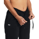 Pantalon Under Armour Rival Woven pour femme avec technologie UA Storm, tissu extensible et taille haute ajustable