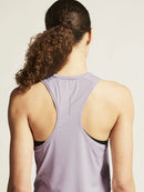 Débardeur Craft ADV Essence Singlet 2 Aster pour femme avec dos nageur, panneaux en maille respirants et tissu en polyester recyclé