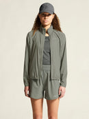 Veste Craft CORE Essence Wind Jacket légère coupe-vent avec poches zippées pour course et entraînement extérieur