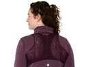 Chandail de course Asics NAGINO Run Winter LS pour femme avec tissu brossé à séchage rapide, col montant, panneaux en mesh respirants et passe-pouces, conçu pour la course par temps frais et hivernal.