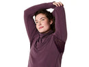 Chandail de course Asics NAGINO Run Winter LS pour femme avec tissu brossé à séchage rapide, col montant, panneaux en mesh respirants et passe-pouces, conçu pour la course par temps frais et hivernal.