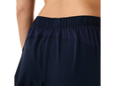 Short Asics COURT 2-N-1 pour femme avec cuissard intégré, tissu léger à séchage rapide, poche pratique et panneaux en mesh respirants, idéal pour le tennis, le pickleball et l'entraînement.