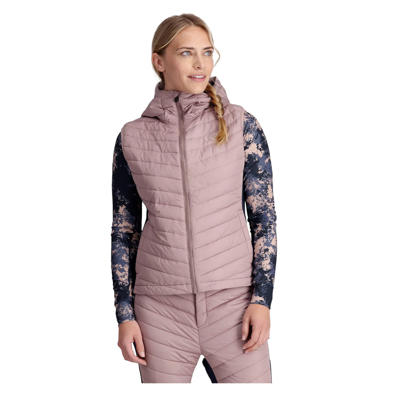 Veste sans manches Kari Traa Eva – coupe féminine, capuchon, panneaux stretch, isolation duvet, couleur foncée.