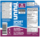 Tube de pastilles électrolytiques Nuun Sport Triberry pour l’hydratation sportive.