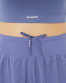 Short de course Salomon SENSE AERO STOW 4 léger avec rangement intégré et poche zippée pour téléphone