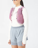 Veste d'hydratation Salomon Active Skin 4 de 4 litres avec deux flasques souples de 500 ml, offrant un ajustement stable, léger et respirant pour le trail running et la course en sentier.