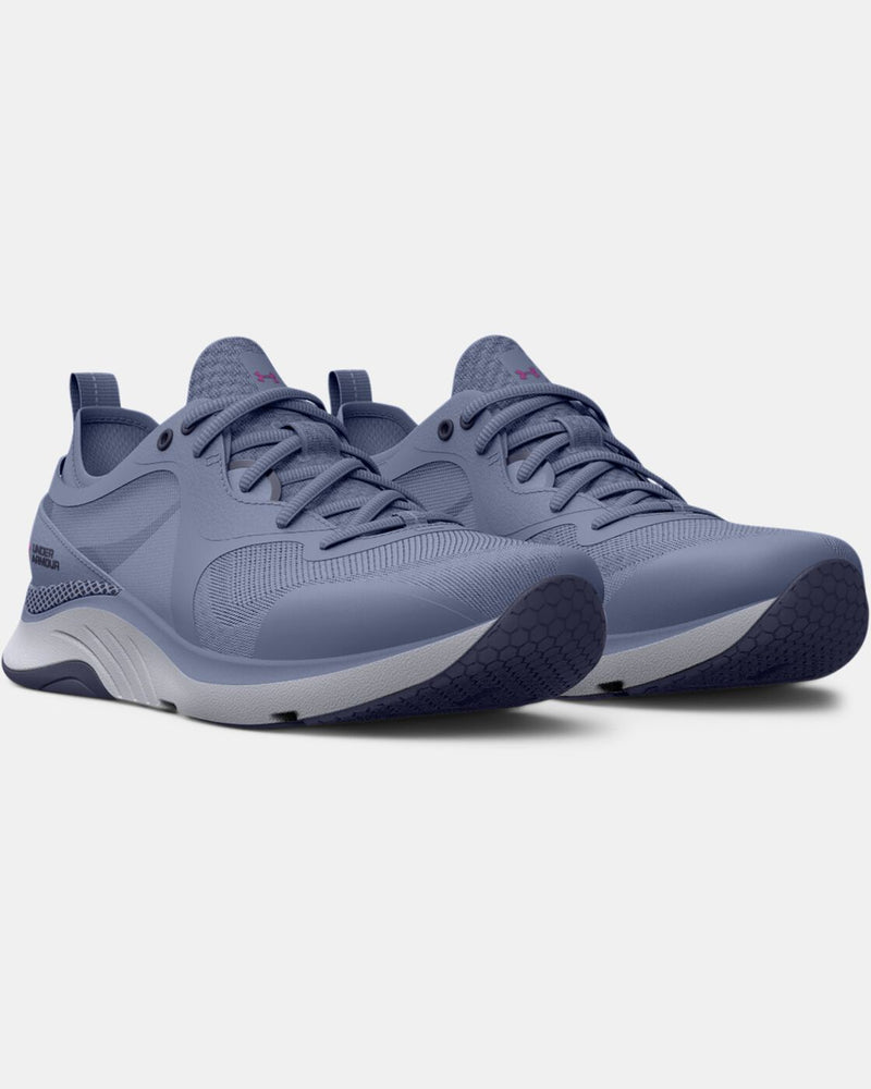 Chaussure d’entraînement UA HOVR™ pour femme, tige en mesh respirant, semelle HOVR amortissante – conçue pour le confort et la stabilité.