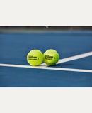Tube de 3 balles de tennis Wilson Triniti Pro avec technologie Engage Core et feutre tissé haut de gamme pour une performance durable.