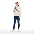 Chandail à capuchon New Balance Athletics pour femme avec coupe oversized et logo brodé.