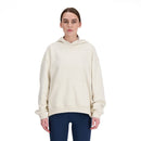 Chandail à capuchon New Balance Athletics pour femme avec coupe oversized et logo brodé.