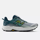 Chaussures de trail New Balance FuelCell Rebel Trail avec amorti FuelCell et semelle Vibram Megagrip offrant légèreté, traction et performance sur les sentiers.