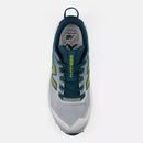 Chaussures de trail New Balance FuelCell Rebel Trail avec amorti FuelCell et semelle Vibram Megagrip offrant légèreté, traction et performance sur les sentiers.