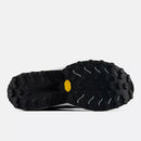 Chaussures de trail New Balance FuelCell Rebel Trail avec amorti FuelCell et semelle Vibram Megagrip offrant légèreté, traction et performance sur les sentiers.