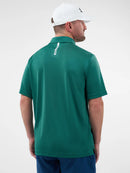 Polo Selkirk Essentials Sport-Wik vert pour homme avec tissu respirant à séchage rapide conçu pour le pickleball et les activités sportives.