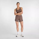 Soutien-gorge de sport New Balance Essential Run avec maintien élevé et bretelles ajustables.