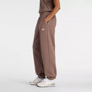 Pantalon jogger New Balance Sport Essentials Fleece avec tissu molletonné et logo brodé.