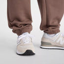 Pantalon jogger New Balance Sport Essentials Fleece avec tissu molletonné et logo brodé.