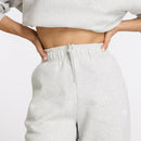 Pantalon jogger New Balance Sport Essentials Fleece avec tissu molletonné et logo brodé.
