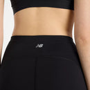 Accents réfléchissants sur legging New Balance NB Heat femme