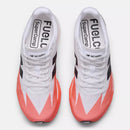 Chaussure de course New Balance FuelCell SuperComp Elite v5 avec mousse PEBA FuelCell, plaque de carbone et technologie Energy Arc pour la compétition sur route.
