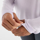 chandail à manches longues NB ICEx gris, avec tissu respirant et trous pour les pouces, idéal pour le sport.