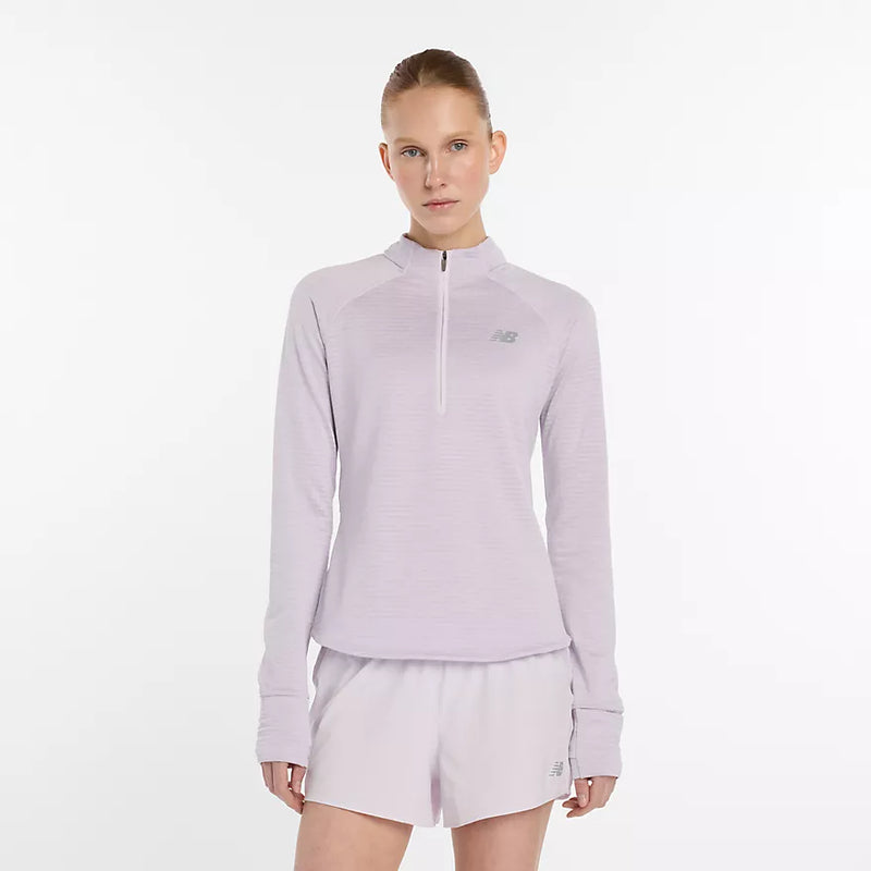 Vêtement de course New Balance demi-zip avec technologie NB HEAT